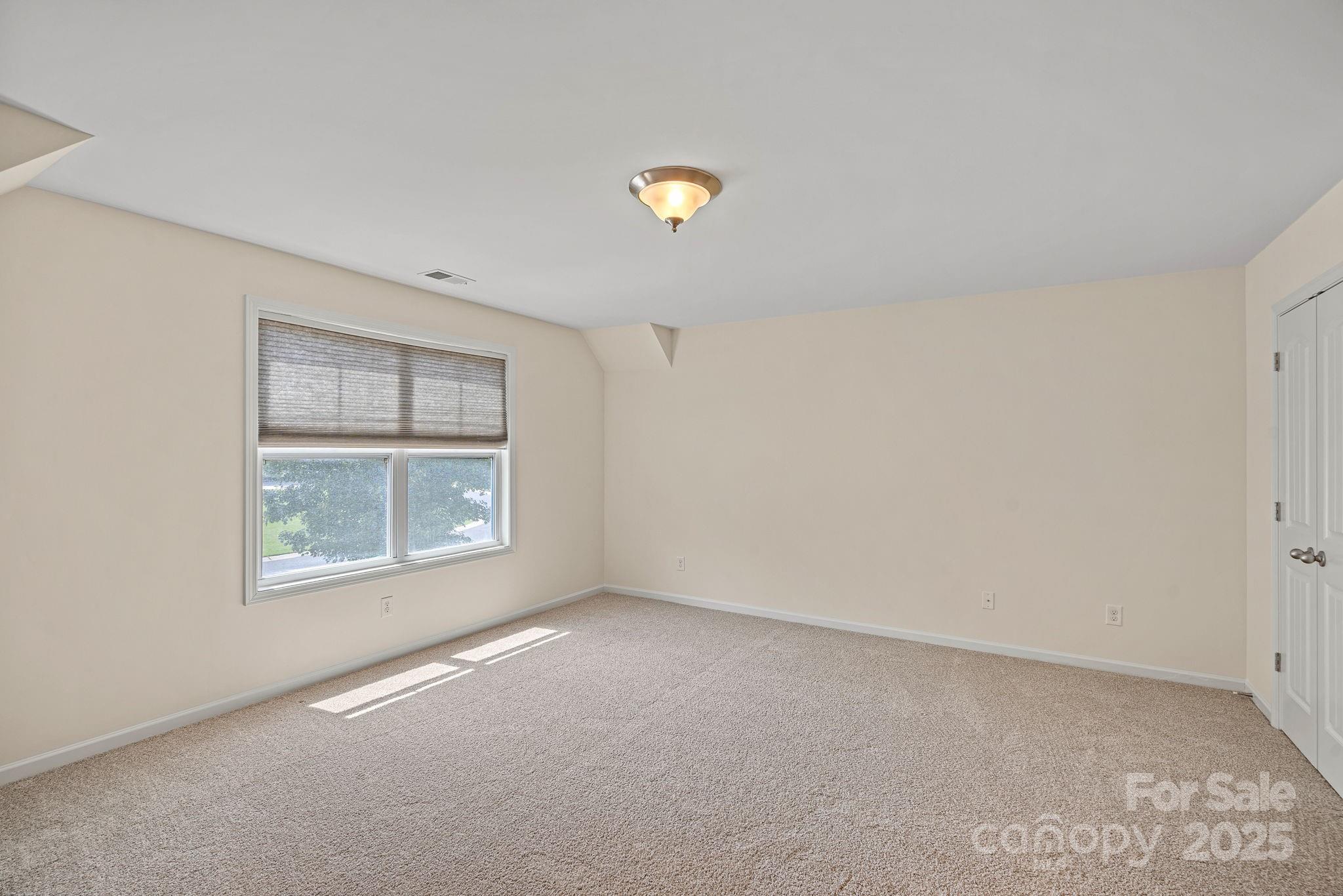 2079 Lakebridge Drive Fort Mill, SC 29715 - Photo 18 of 33 an empty room with a window