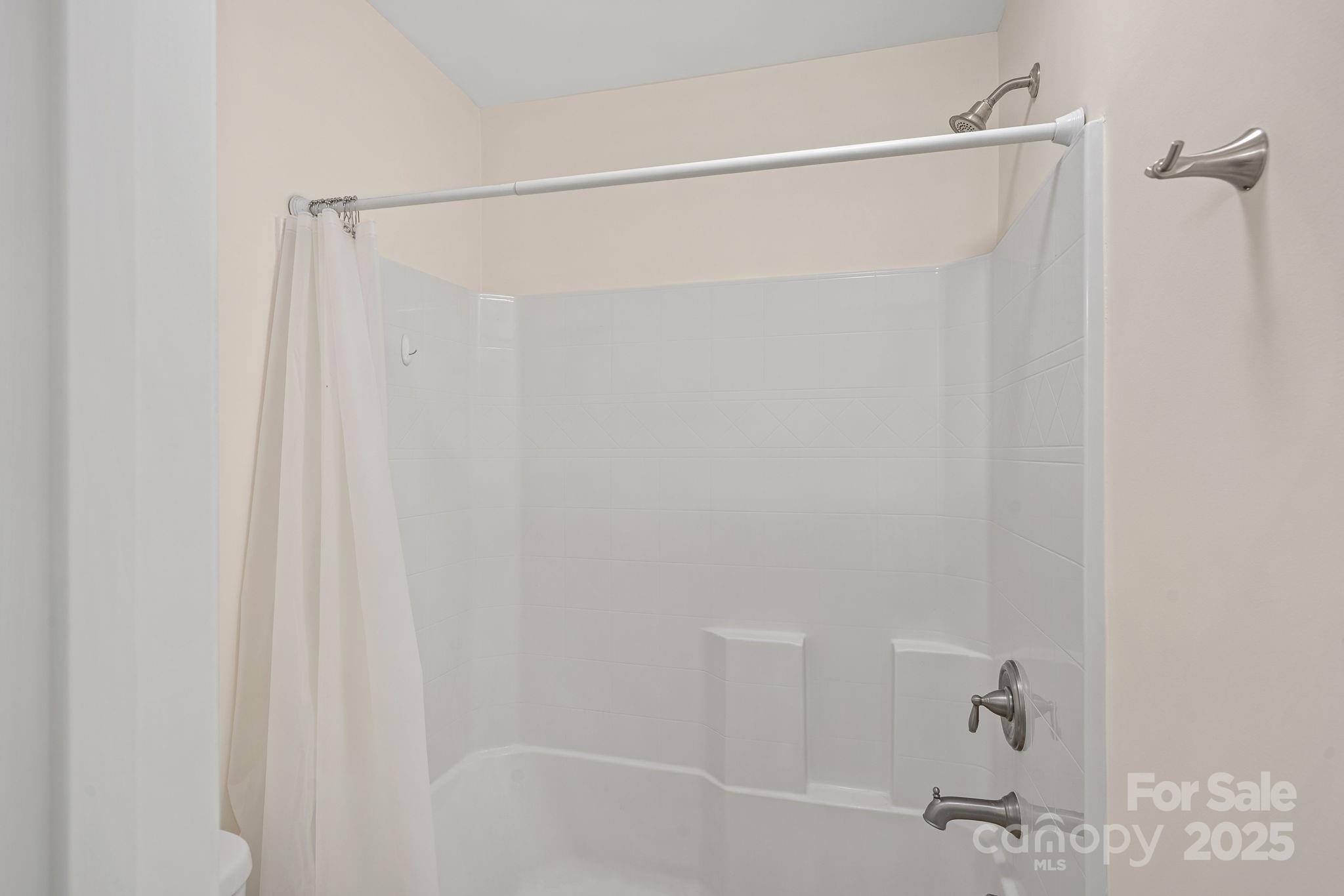 2079 Lakebridge Drive Fort Mill, SC 29715 - Photo 20 of 33 a bathroom with a shower and a bath tub