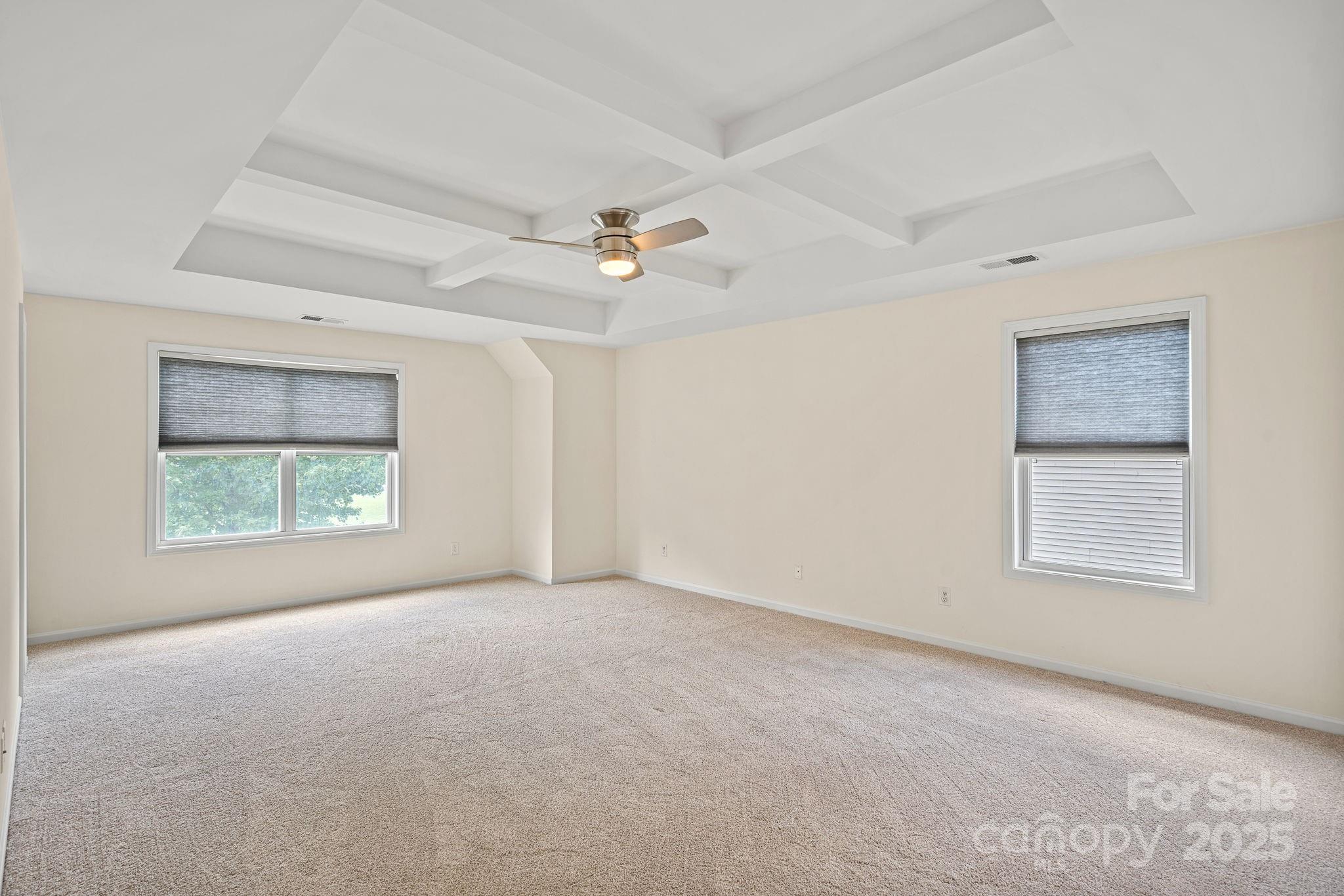2079 Lakebridge Drive Fort Mill, SC 29715 - Photo 25 of 33 an empty room with windows and closet
