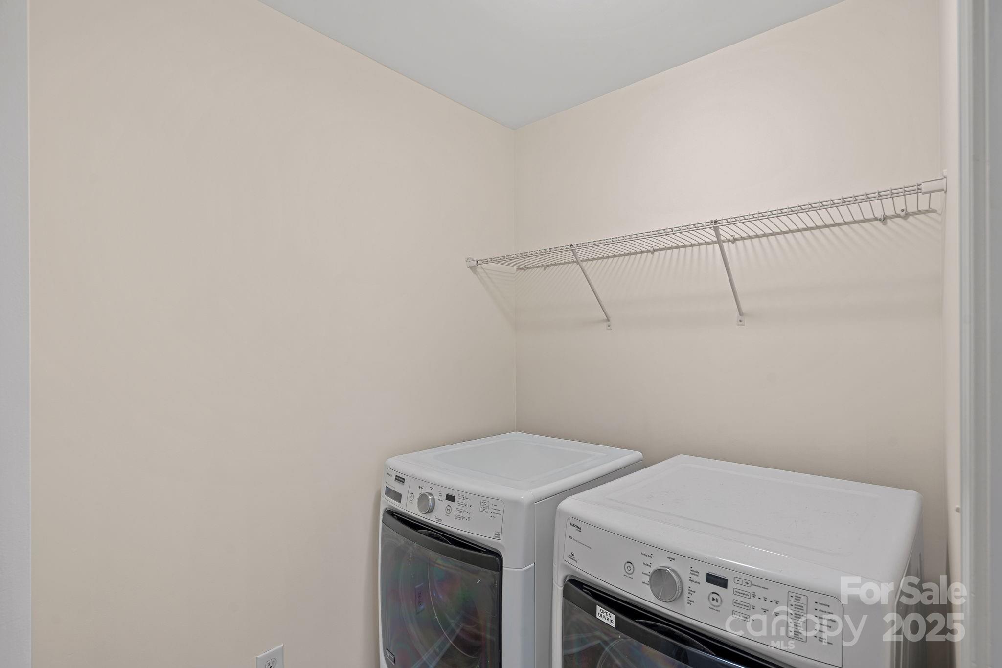 2079 Lakebridge Drive Fort Mill, SC 29715 - Photo 29 of 33 a utility room with dryer and washer