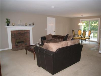 46 Cap'n Jac's Road Centerville, MA 02632 - Photo 2 of 25 a living room with furniture and a fireplace