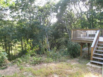 46 Cap'n Jac's Road Centerville, MA 02632 - Photo 22 of 25 a view of a house with a deck