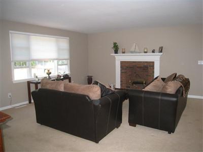 46 Cap'n Jac's Road Centerville, MA 02632 - Photo 3 of 25 a living room with furniture and a fireplace