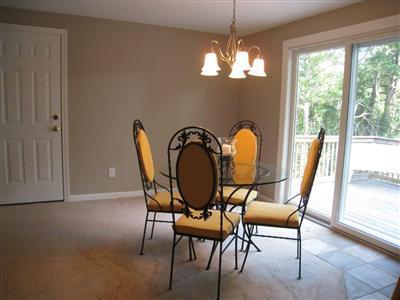46 Cap'n Jac's Road Centerville, MA 02632 - Photo 6 of 25 a view of a dining room with furniture window and outside view