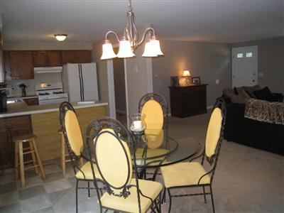 46 Cap'n Jac's Road Centerville, MA 02632 - Photo 8 of 25 a view of a dining room with furniture and chandelier