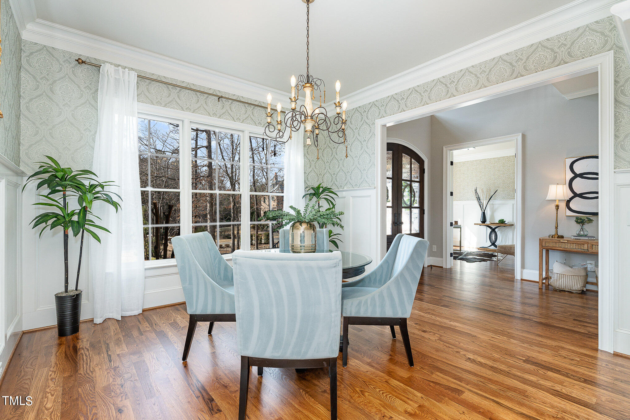 10632 Marion Stone Way Raleigh, NC 27614 - Photo 17 of 95 a view of a dining room with furniture window and wooden floor