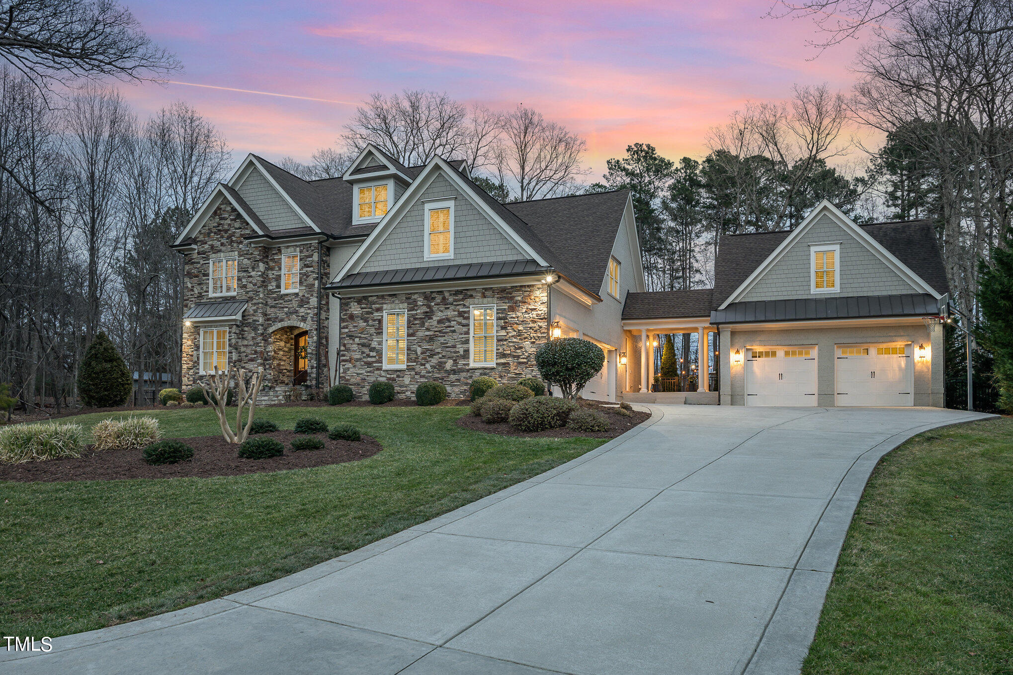 10632 Marion Stone Way Raleigh, NC 27614 - Photo 2 of 95 a front view of a house with garden