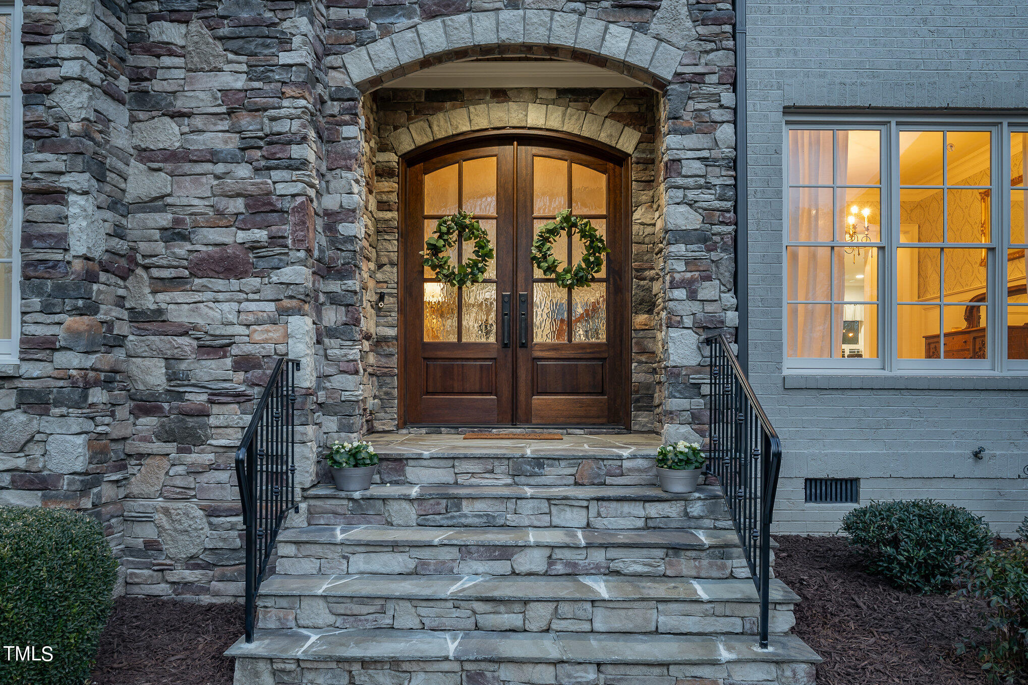 10632 Marion Stone Way Raleigh, NC 27614 - Photo 3 of 95 a front view of a house with a garden