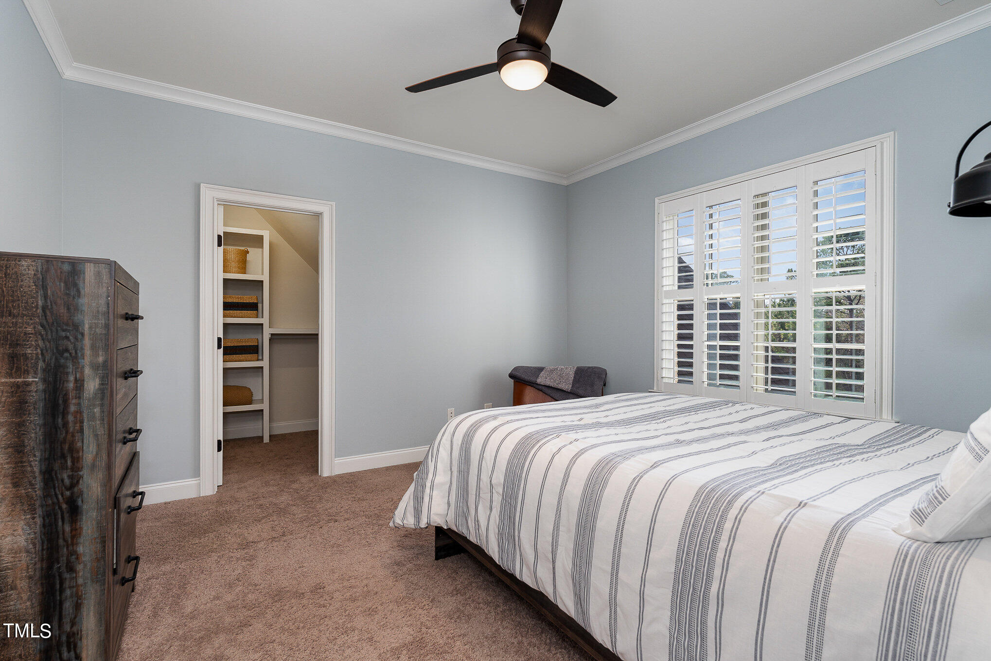 10632 Marion Stone Way Raleigh, NC 27614 - Photo 40 of 95 a bedroom with a bed closet and a window