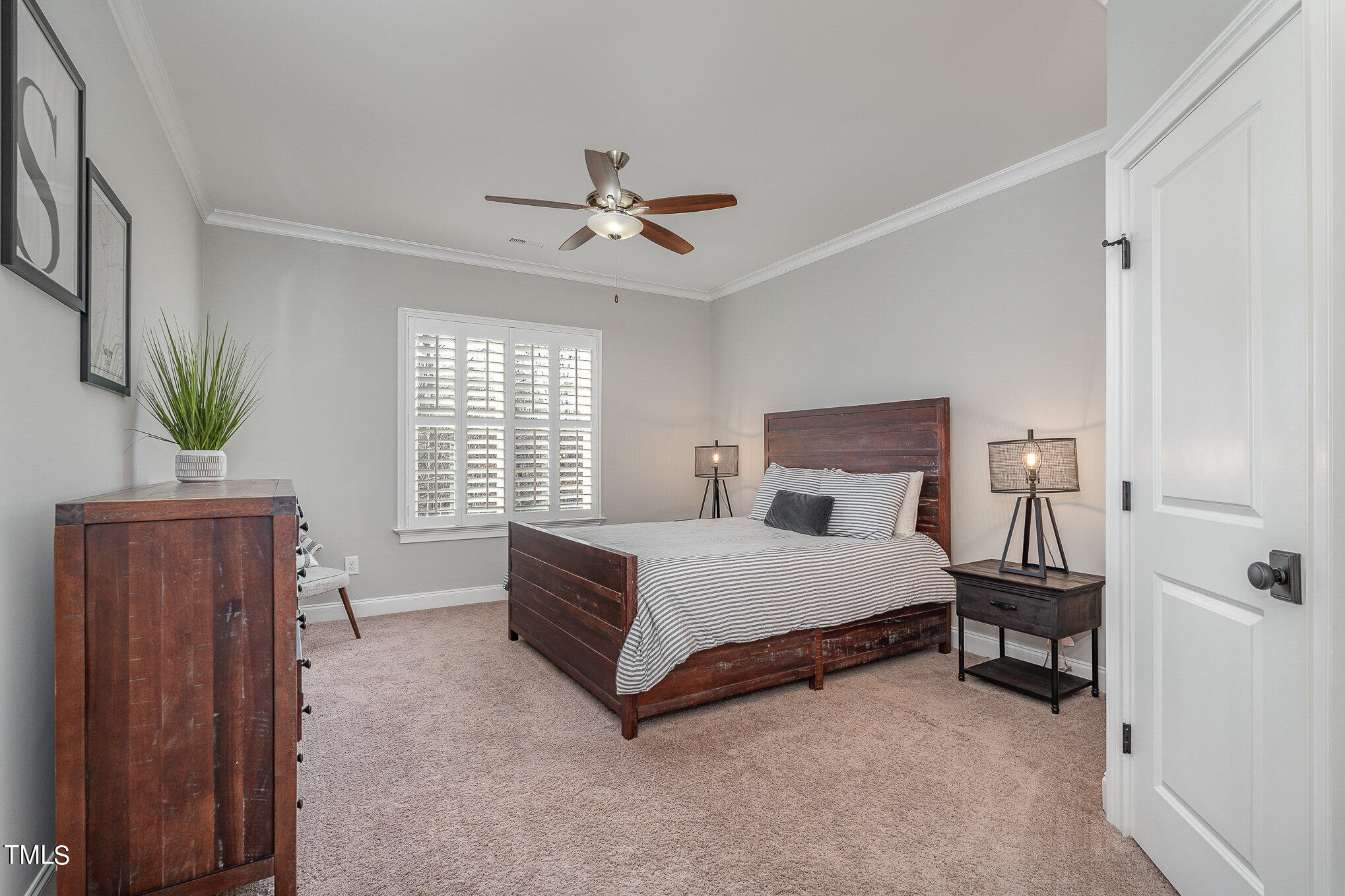 10632 Marion Stone Way Raleigh, NC 27614 - Photo 59 of 95 a spacious bedroom with a bed and a window