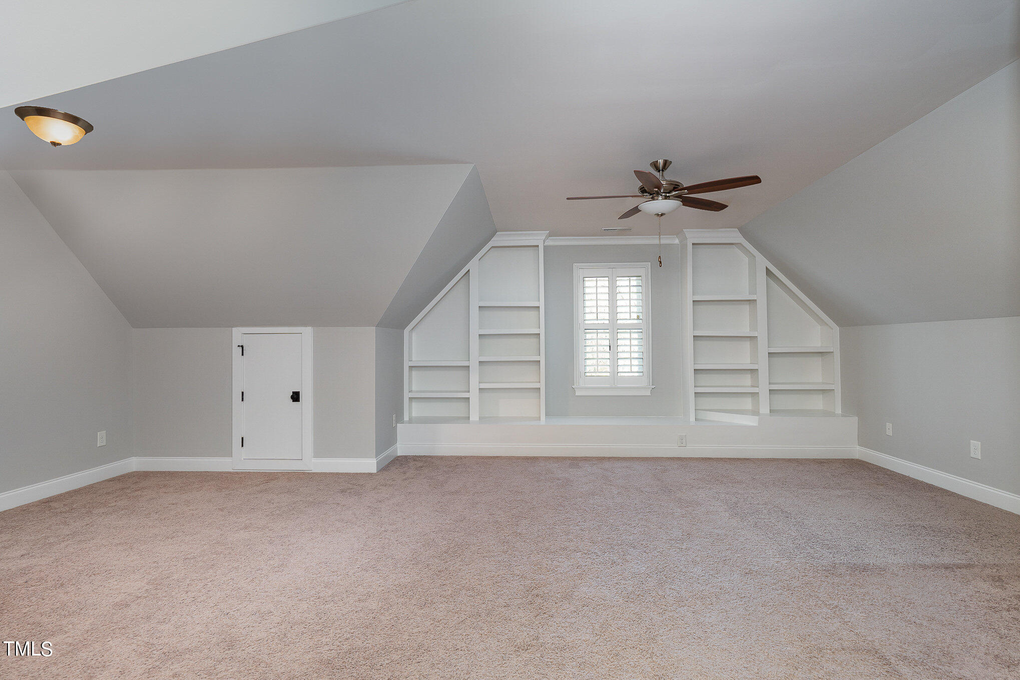 10632 Marion Stone Way Raleigh, NC 27614 - Photo 70 of 95 a view of an empty room with a window