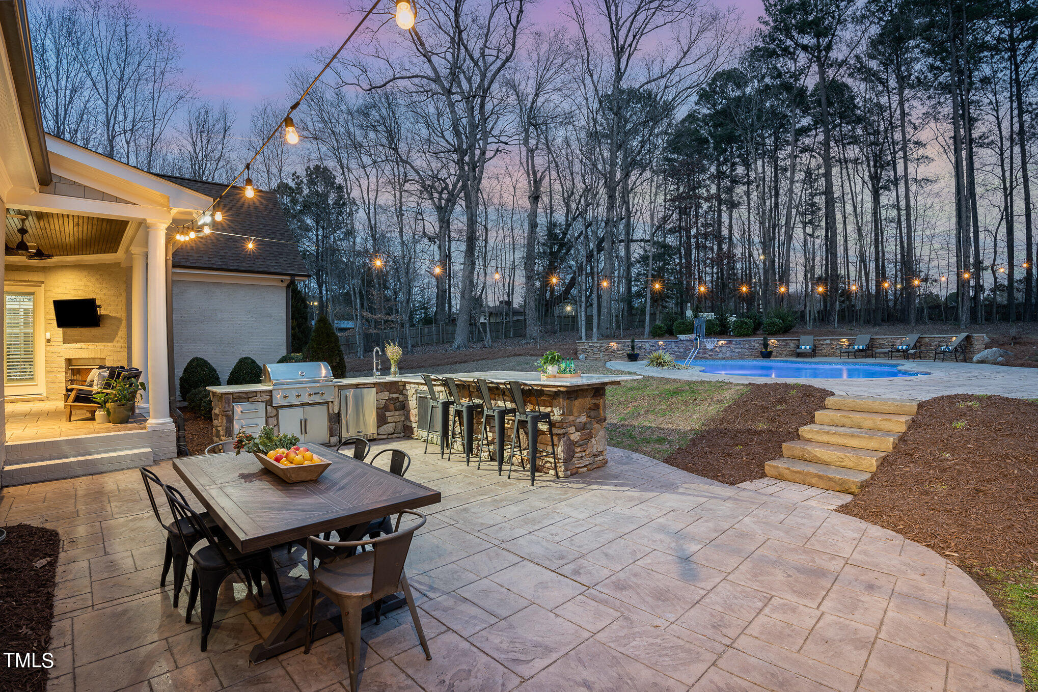 10632 Marion Stone Way Raleigh, NC 27614 - Photo 78 of 95 a view of a swimming pool with sitting area