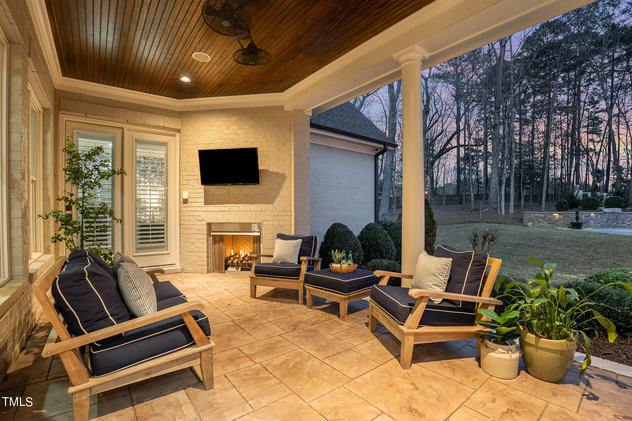 10632 Marion Stone Way Raleigh, NC 27614 - Photo 79 of 95 a building outdoor space with patio furniture and potted plants