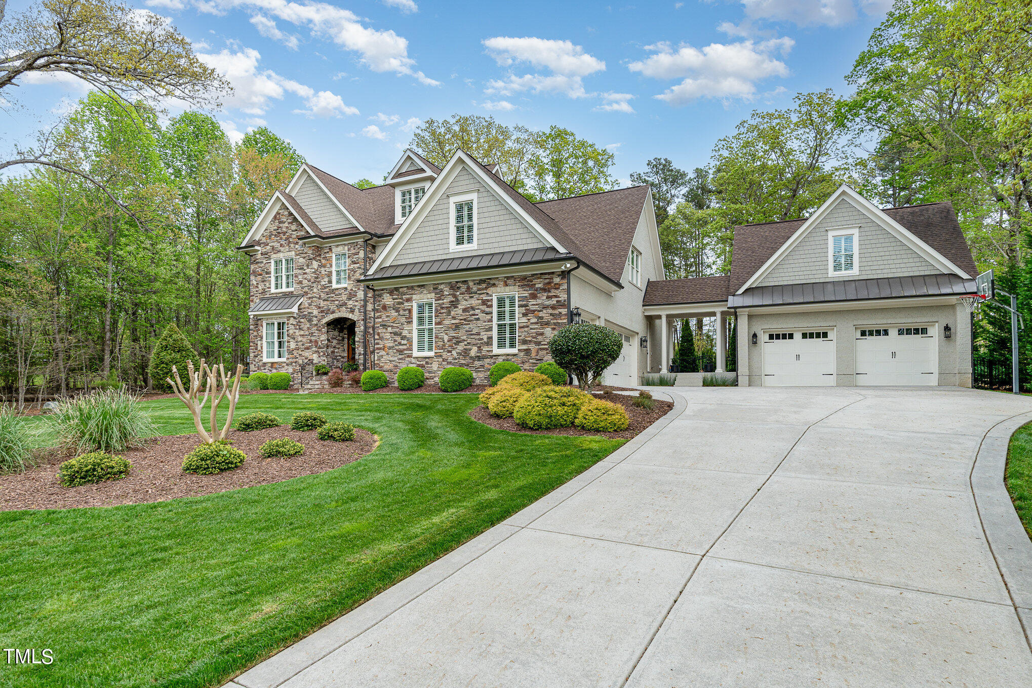10632 Marion Stone Way Raleigh, NC 27614 - Photo 83 of 95 a front view of a house with a garden and plants