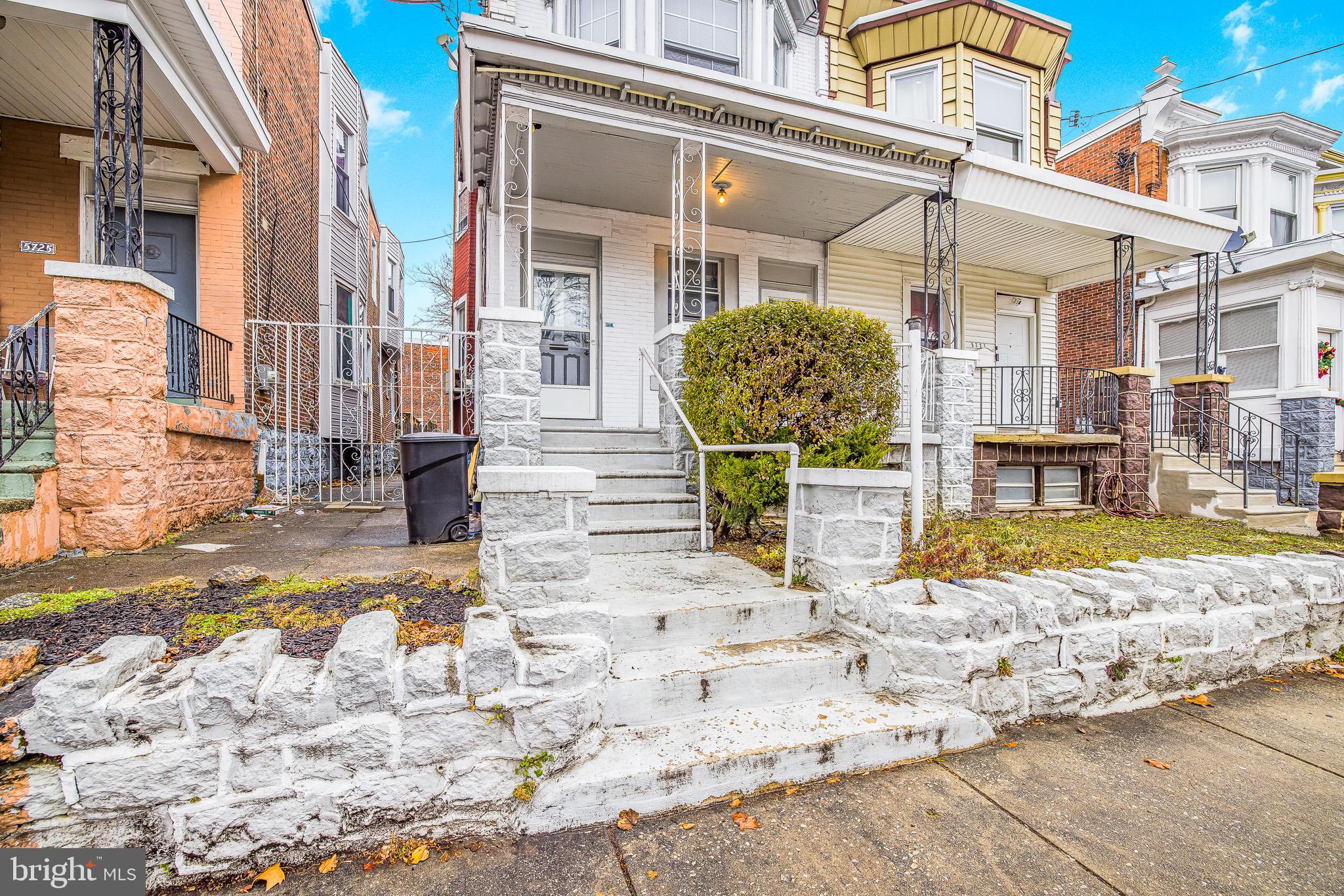 5723 Spruce Street, Unit 2 Philadelphia, PA 19139 - Photo 15 of 16 a view of a building with a patio