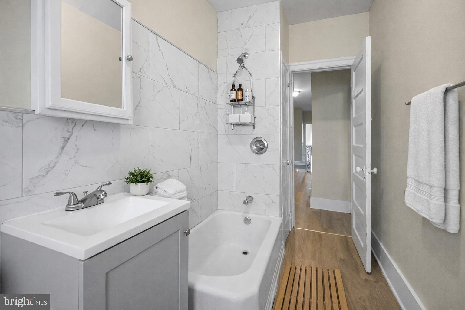 5723 Spruce Street, Unit 2 Philadelphia, PA 19139 - Photo 2 of 16 Updated bathroom