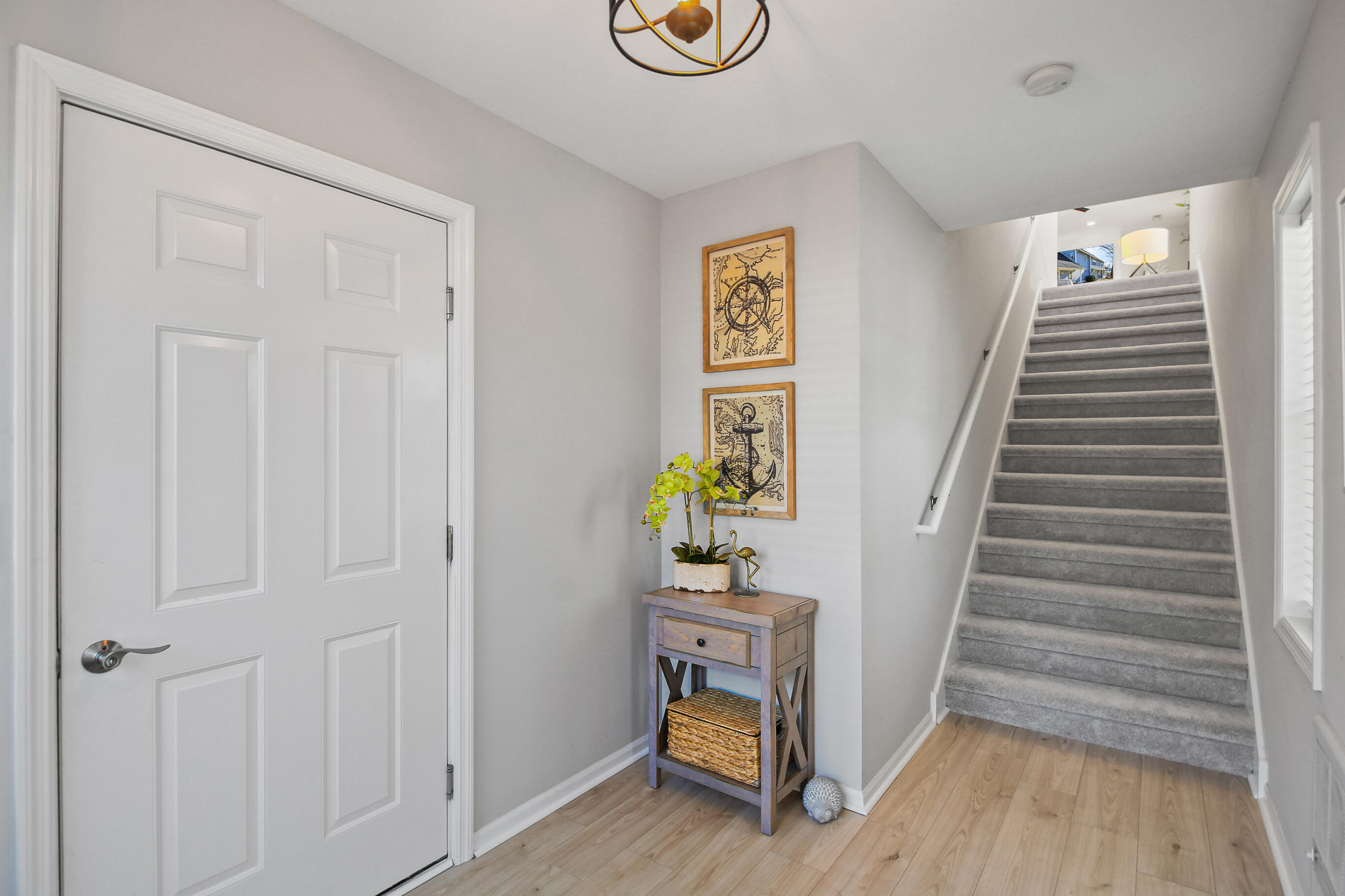 453 Mill Street, Unit 802 Fontana, WI 53125 - Photo 12 of 56 Garage Entry & Oversized Staircase
