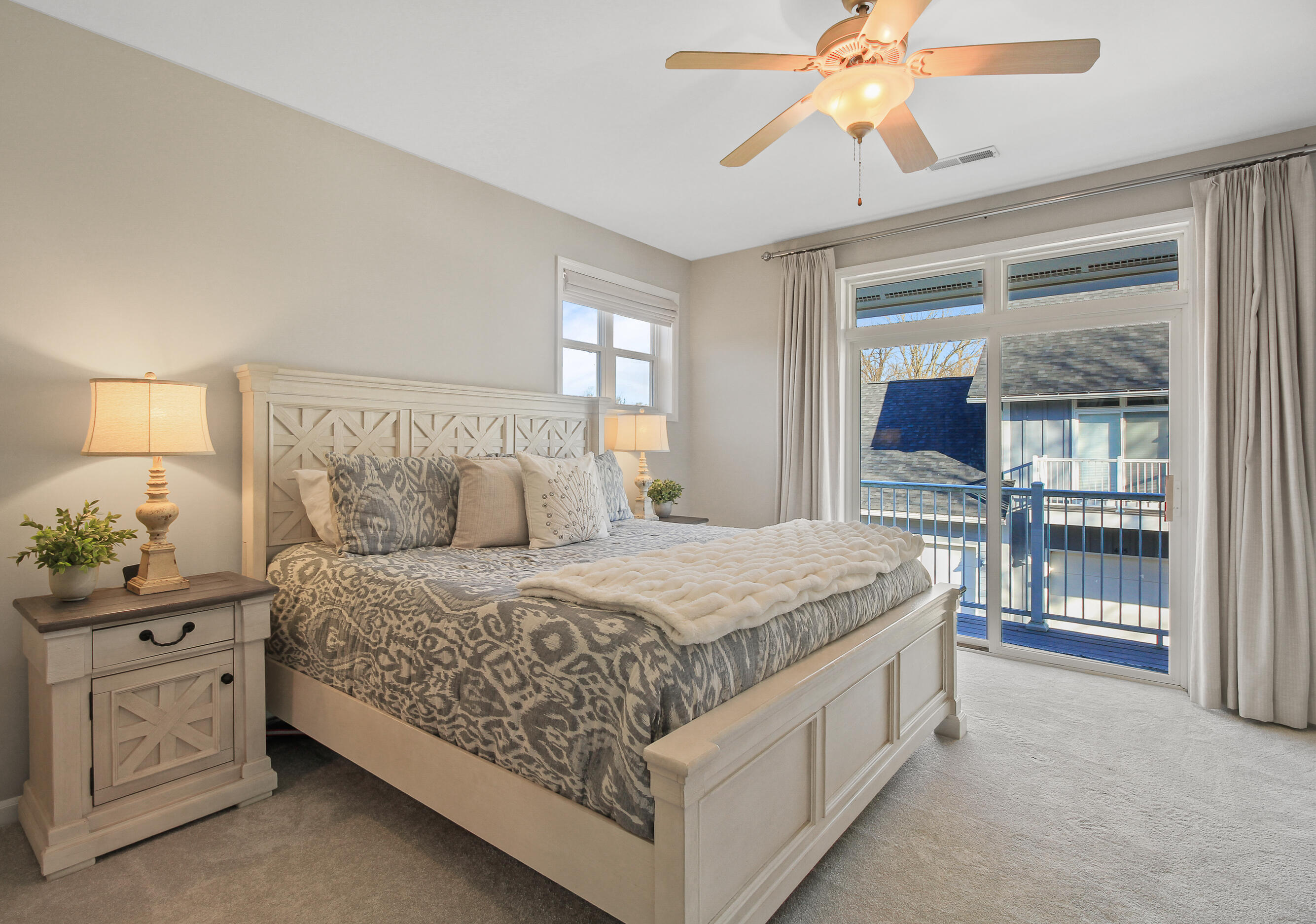 453 Mill Street, Unit 802 Fontana, WI 53125 - Photo 28 of 56 Primary Bedroom & Balcony