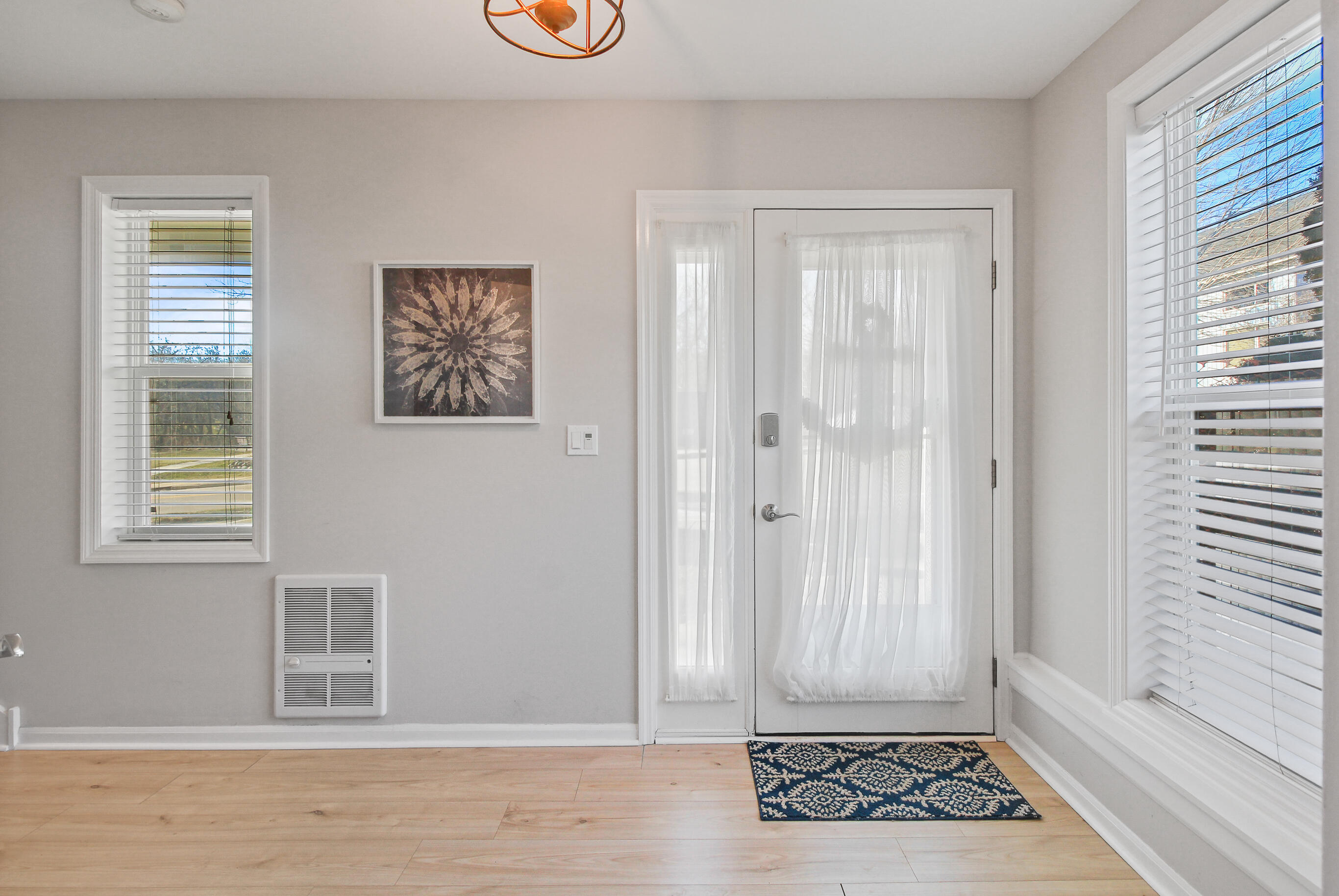 453 Mill Street, Unit 802 Fontana, WI 53125 - Photo 5 of 57 Bright & spacious foyer