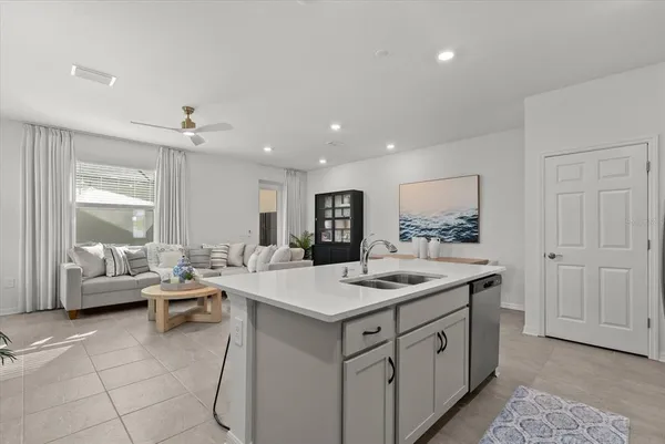 a bedroom with a bed and a table