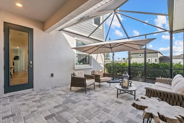 an aerial view of a house with outdoor space