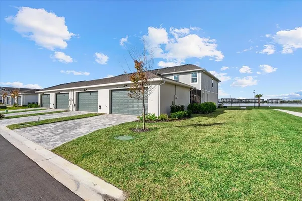 a view of a swimming pool with a lake view