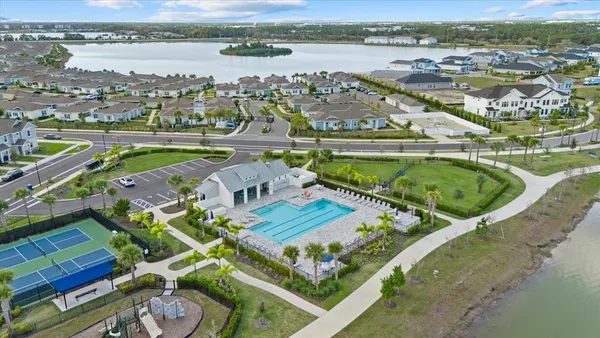 an aerial view of a house with a garden and plants