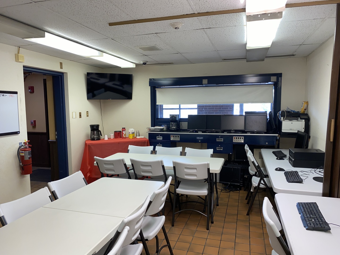 25 East 16th Street Chicago Heights, IL 60411 - Photo 9 of 13 a living room with furniture and a flat screen tv