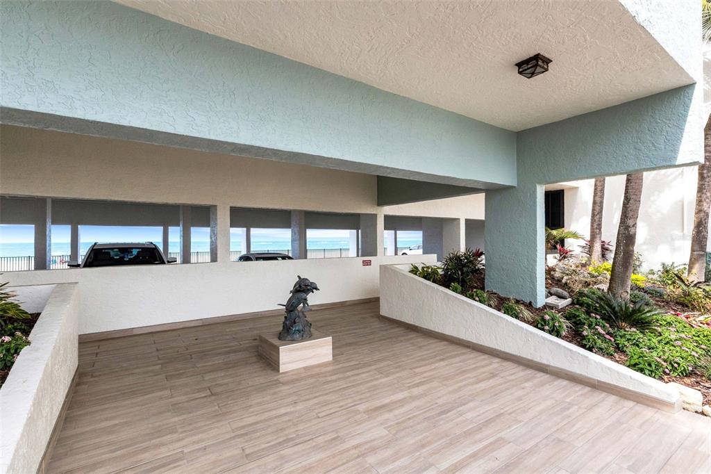 14900 Gulf Boulevard, Unit 410 Madeira Beach, FL 33708 - Photo 6 of 76 a living room with furniture and a large window