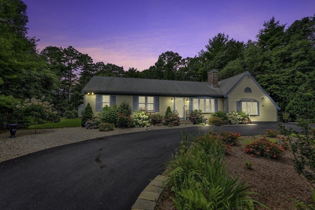 51 Poplar Drive Barnstable, MA 02655 - Photo 20 of 23 a front view of a house with garden