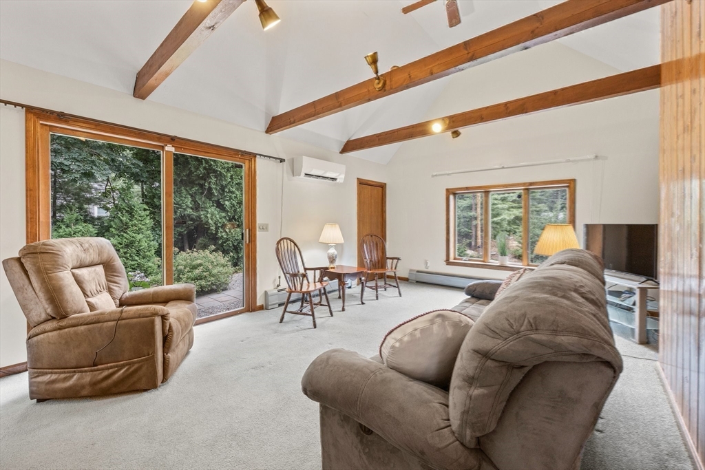 51 Poplar Drive Barnstable, MA 02655 - Photo 4 of 23 a living room with furniture and a large window
