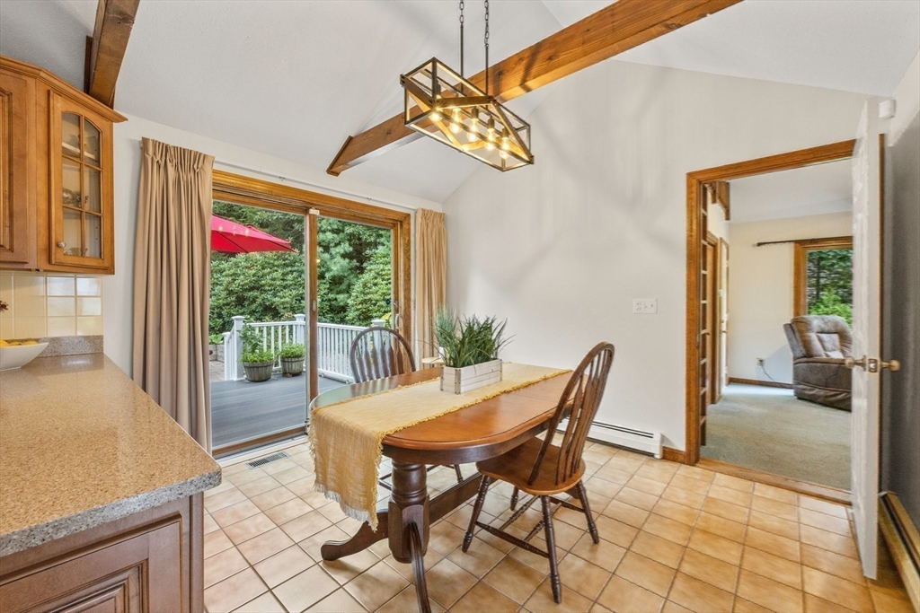 51 Poplar Drive Barnstable, MA 02655 - Photo 6 of 23 a view of a patio with a table and chairs