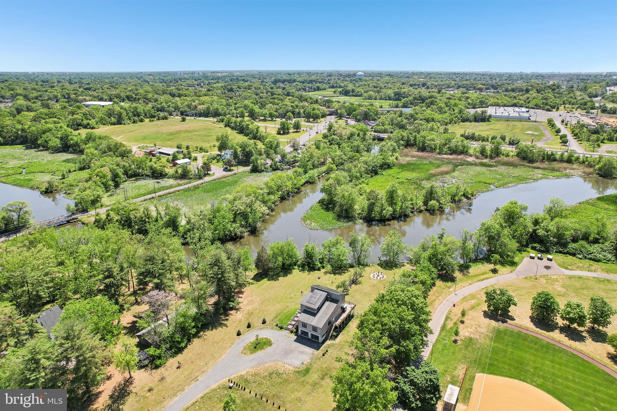 11 Forklanding Road Cinnaminson, NJ 08077 - Photo 58 of 77 an aerial view of residential houses with outdoor space and river