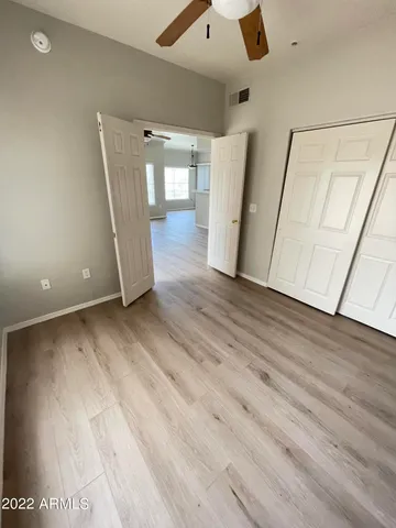a view of entryway with wooden floor