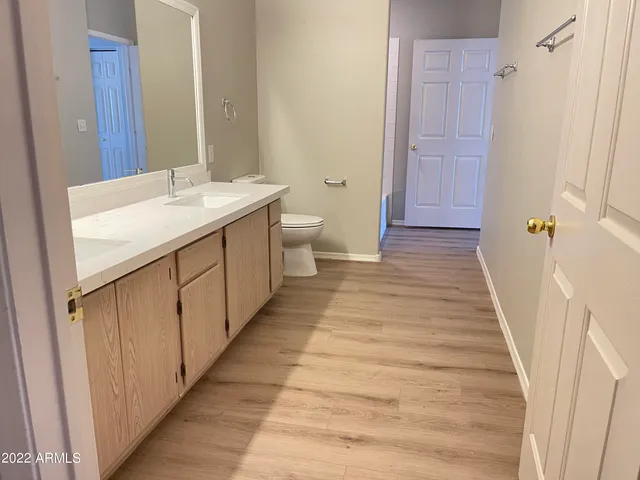 a bathroom with sink and mirror