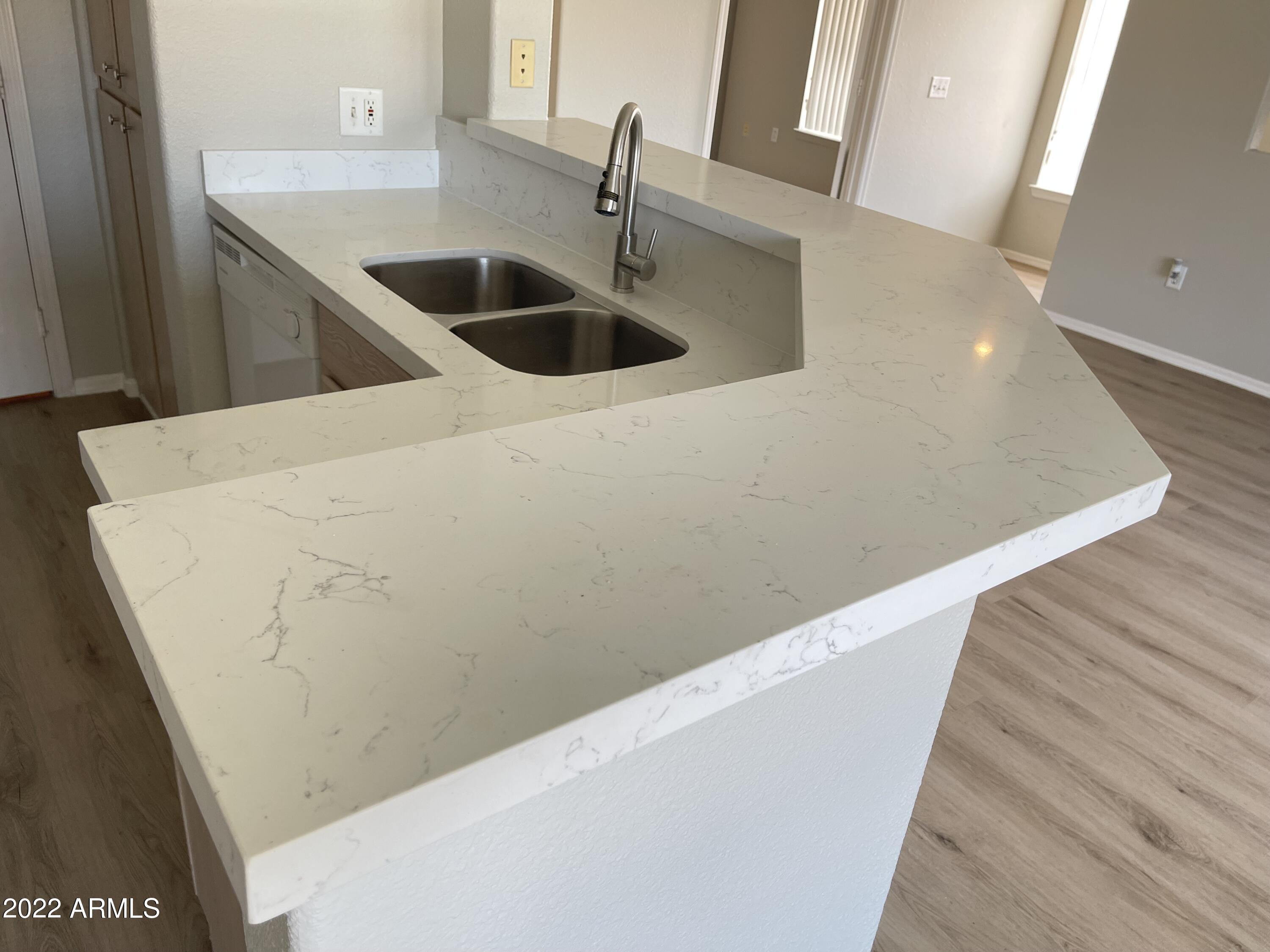 3236 East Chandler Boulevard, Unit 2093 Phoenix, AZ 85048 - Photo 4 of 28 a view of kitchen and sink