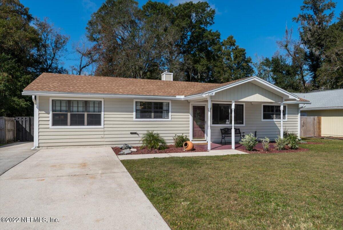 2124 Rothbury Drive Jacksonville, FL 32221 - Photo 2 of 27 a front view of house with yard outdoor seating and green space