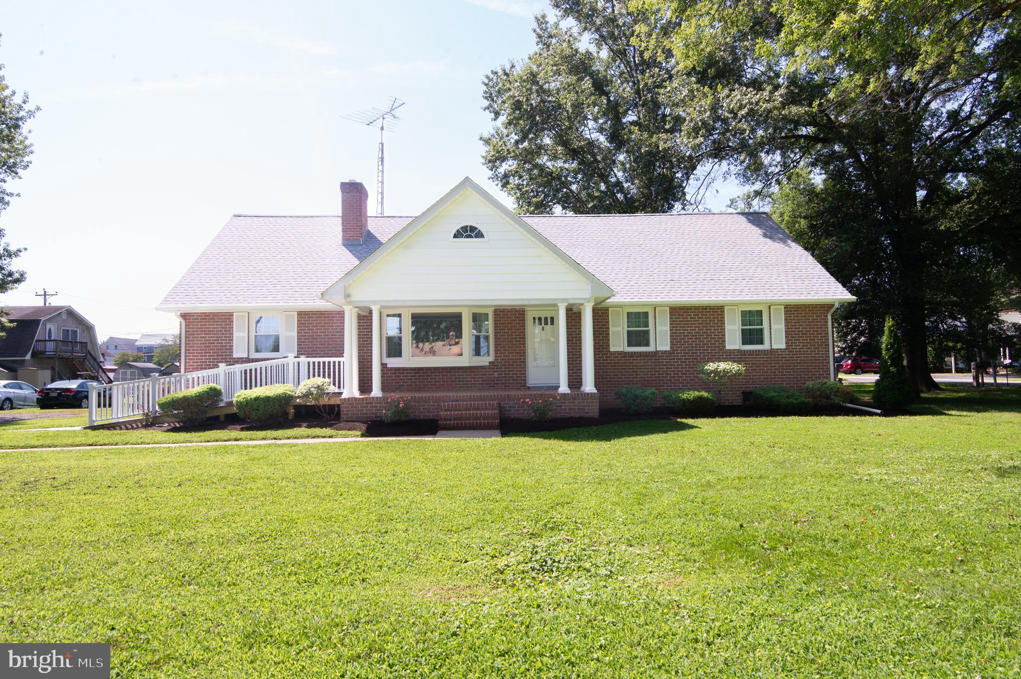 8 West Liberty Street Ridgely, MD 21660 - Photo 2 of 55 a view of a house with a yard and plants
