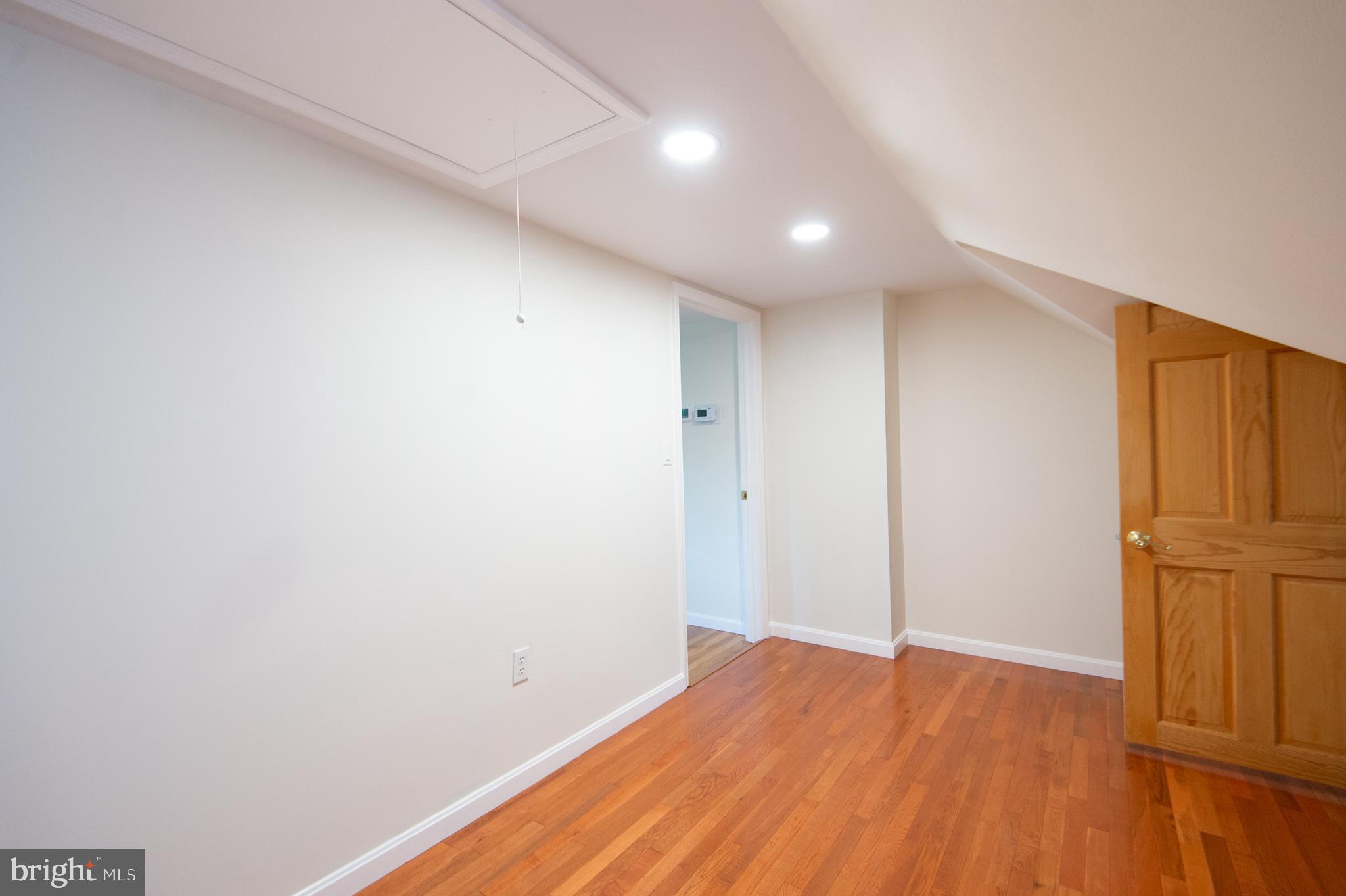 8 West Liberty Street Ridgely, MD 21660 - Photo 30 of 55 a view of empty room with wooden floor