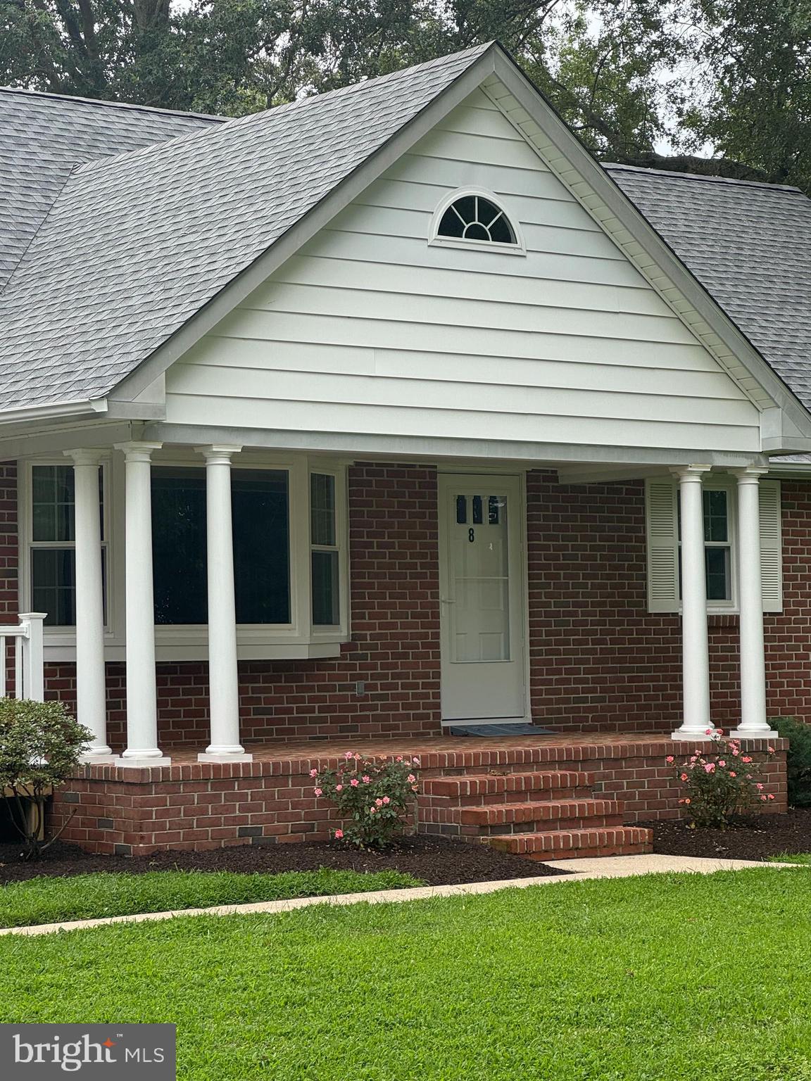 8 West Liberty Street Ridgely, MD 21660 - Photo 3 of 55 a front view of a house with a yard