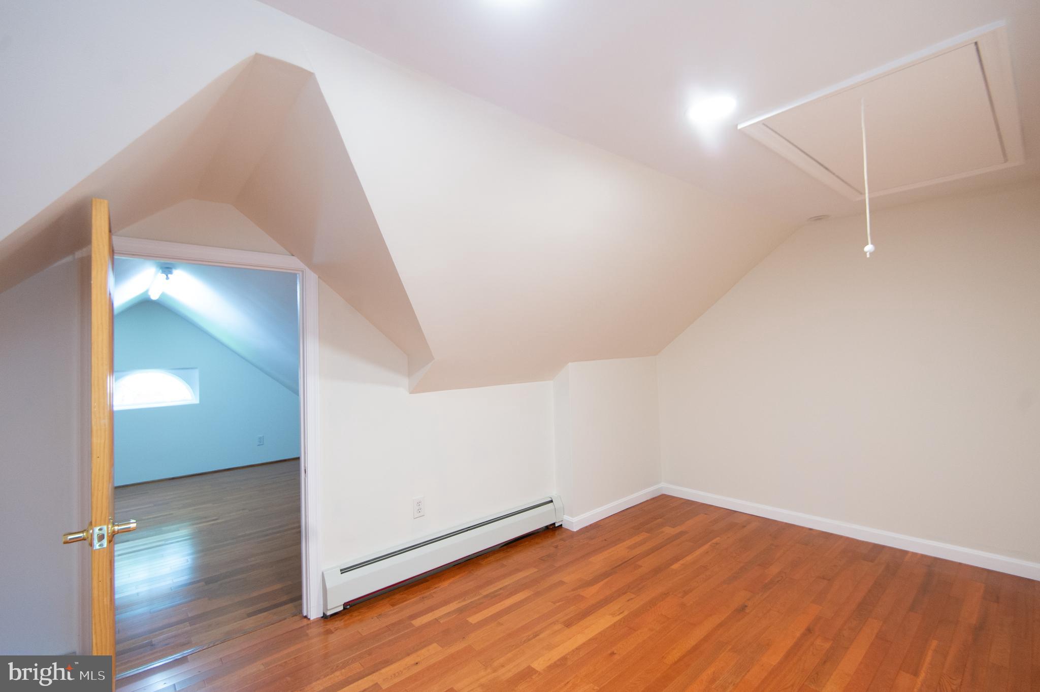 8 West Liberty Street Ridgely, MD 21660 - Photo 31 of 55 an empty room with wooden floor