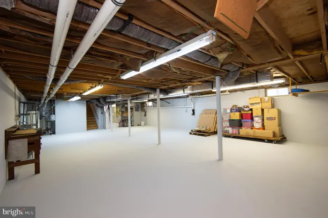 front view of a building with a garden