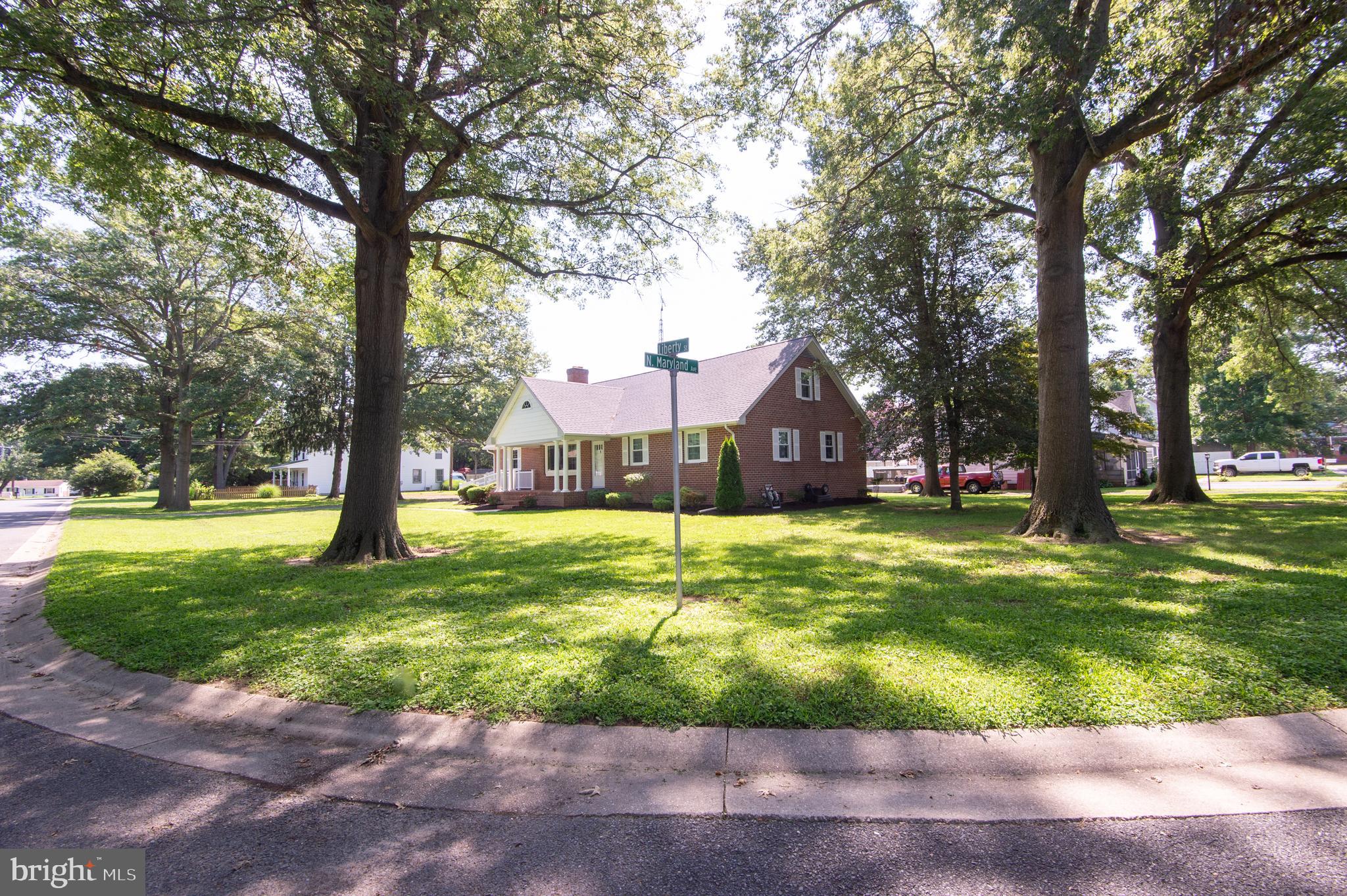 8 West Liberty Street Ridgely, MD 21660 - Photo 41 of 55 a view of a swimming pool with a garden