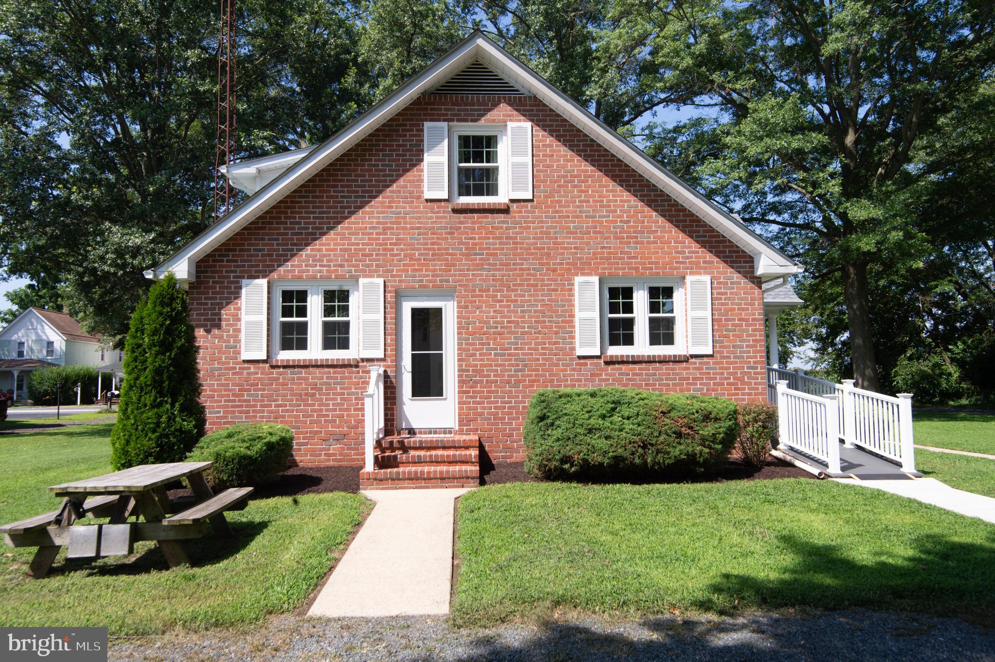 8 West Liberty Street Ridgely, MD 21660 - Photo 5 of 55 a front view of a house with a yard