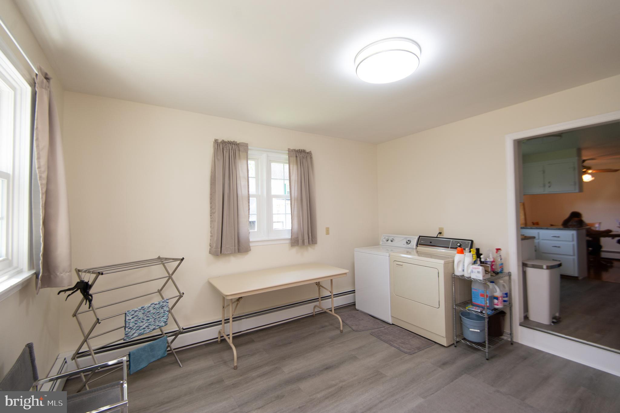 8 West Liberty Street Ridgely, MD 21660 - Photo 6 of 55 a living room with furniture and a window