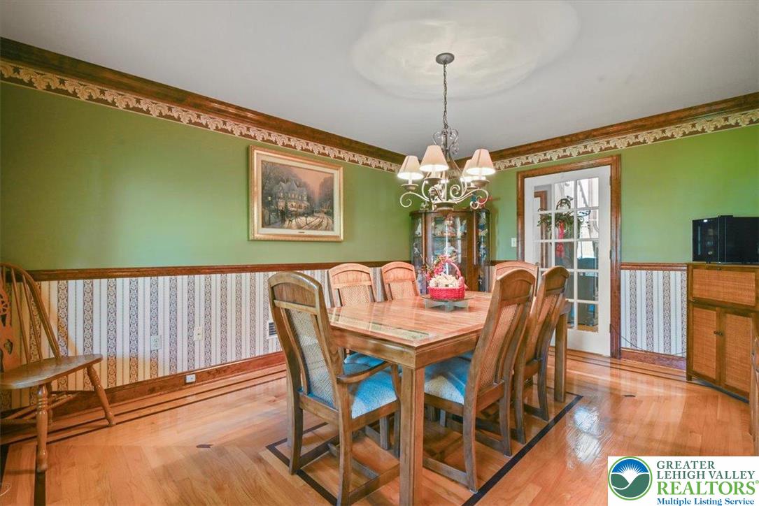 118 Hollow Drive Stroudsburg, PA 18360 - Photo 20 of 45 a view of a dining room with furniture window and wooden floor