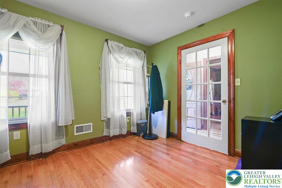 118 Hollow Drive Stroudsburg, PA 18360 - Photo 23 of 45 a view of empty room with a window and wooden floor