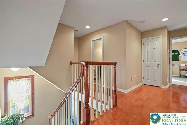 a view of entryway with stairs