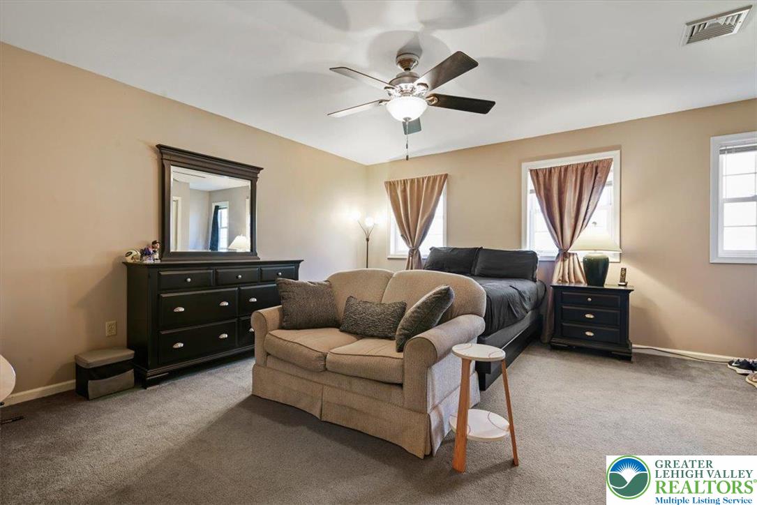 118 Hollow Drive Stroudsburg, PA 18360 - Photo 33 of 45 a bedroom with a bed and a dresser