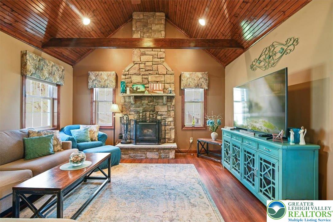 118 Hollow Drive Stroudsburg, PA 18360 - Photo 9 of 45 a living room with furniture and a fireplace